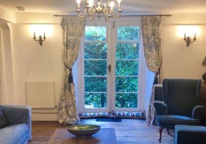 Living room with french doors leading to patio